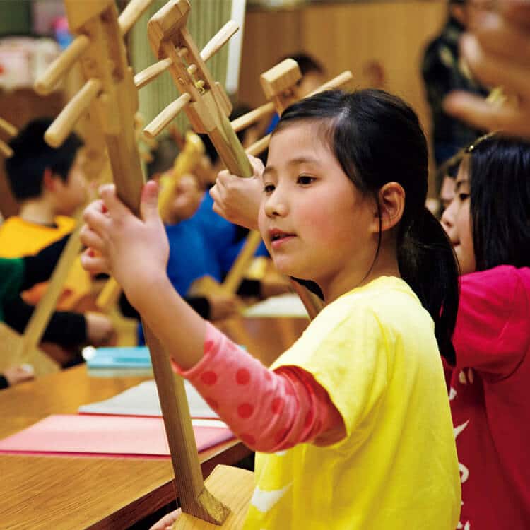 ゴッタンを習う小学生の様子